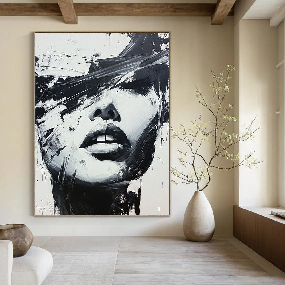 Large abstract black and white painting of a woman's face featuring expressive oil paint splatters in a dynamic graffiti style.STSC023