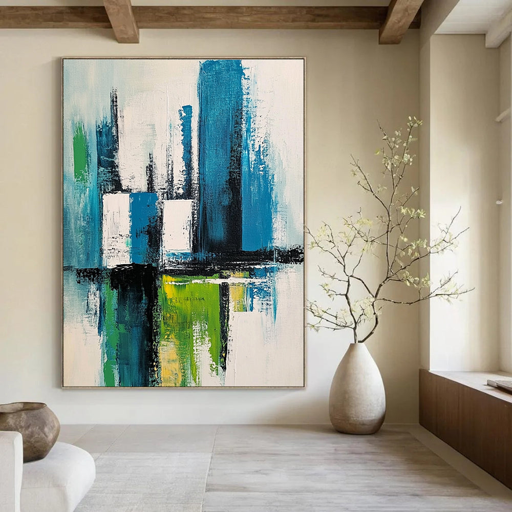 Large abstract painting of a cityscape in blue green and white with thick expressive brush strokes and a minimalistic style.STSC281