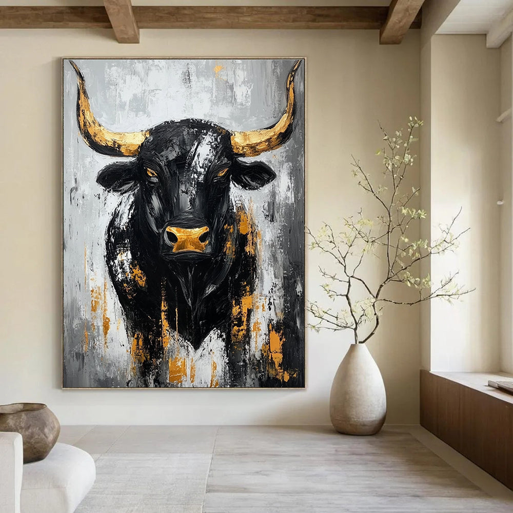 Large abstract painting of a black bull with gold accents against a gray background featuring bold brush strokes and textured impasto technique.STSC027