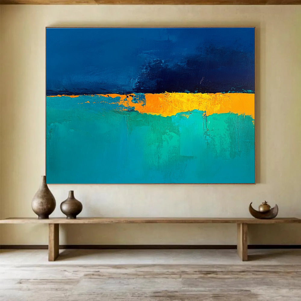 Large abstract painting in deep blue and turquoise with a golden yellow horizon perfect for enhancing modern interiors.SC524