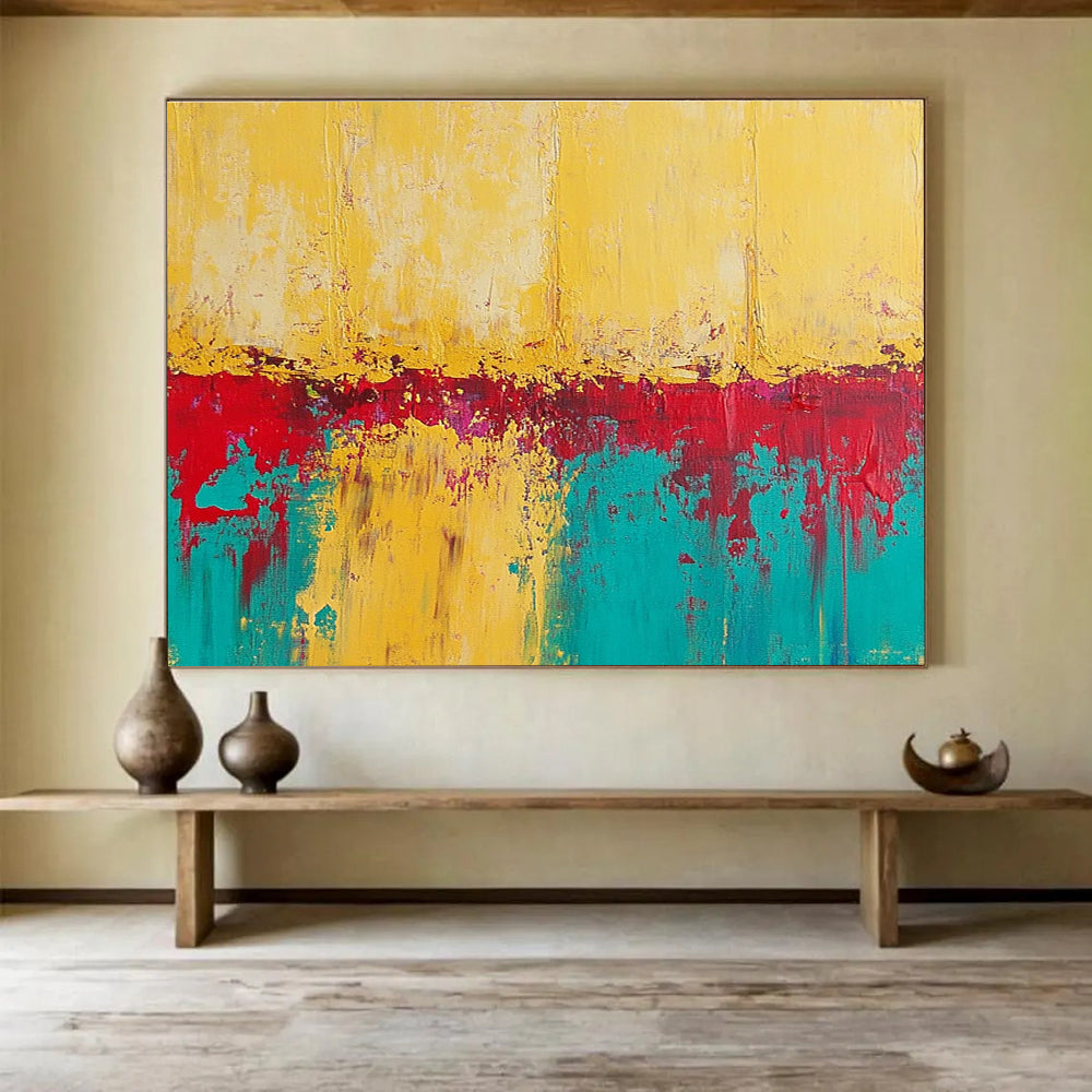 Large abstract painting featuring textured yellow sand with teal and red accents creating a vivid and captivating visual experience.SC269