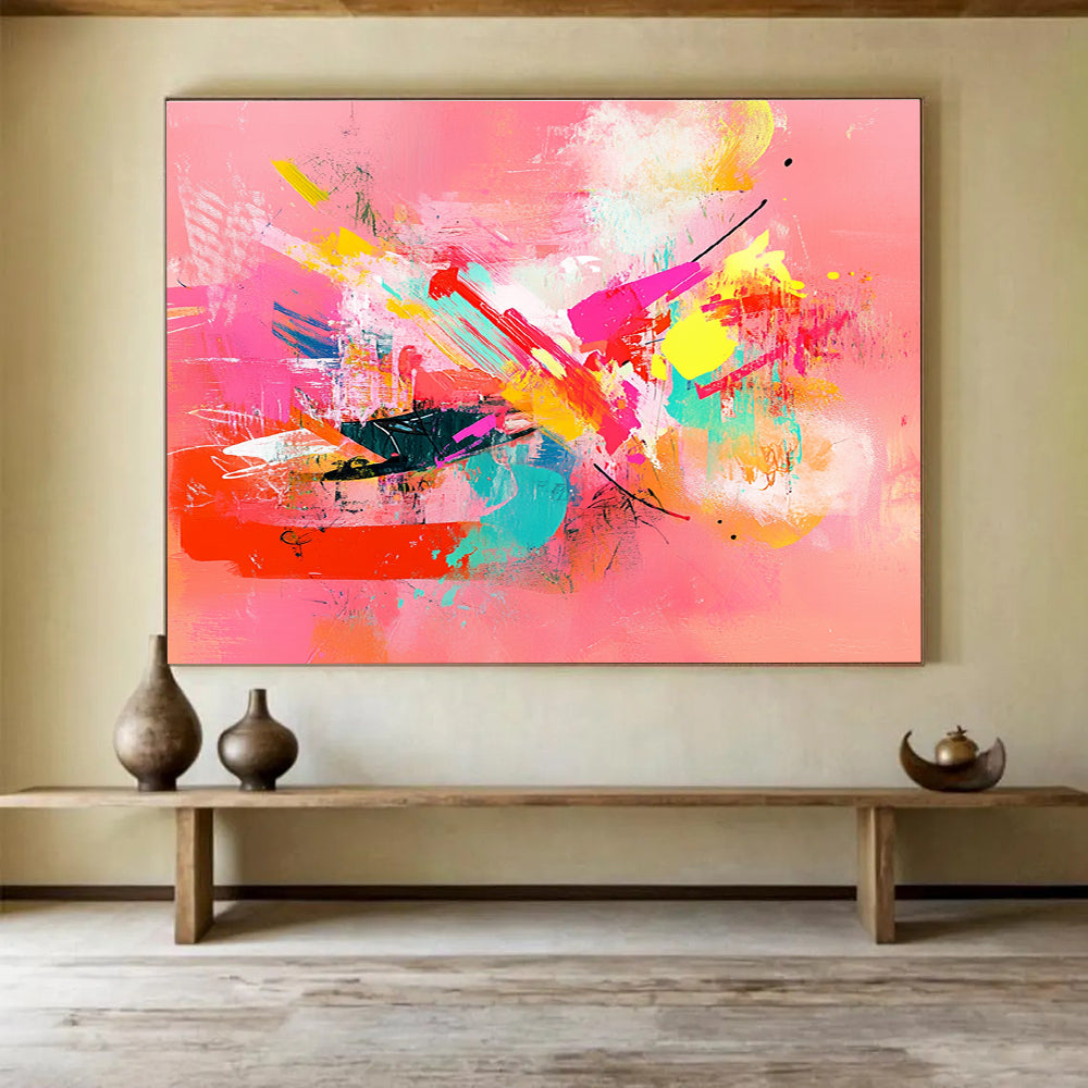 A large abstract painting featuring colorful shapes and lines on a pink background with emotional expressions and a feminine sensibility.SC535