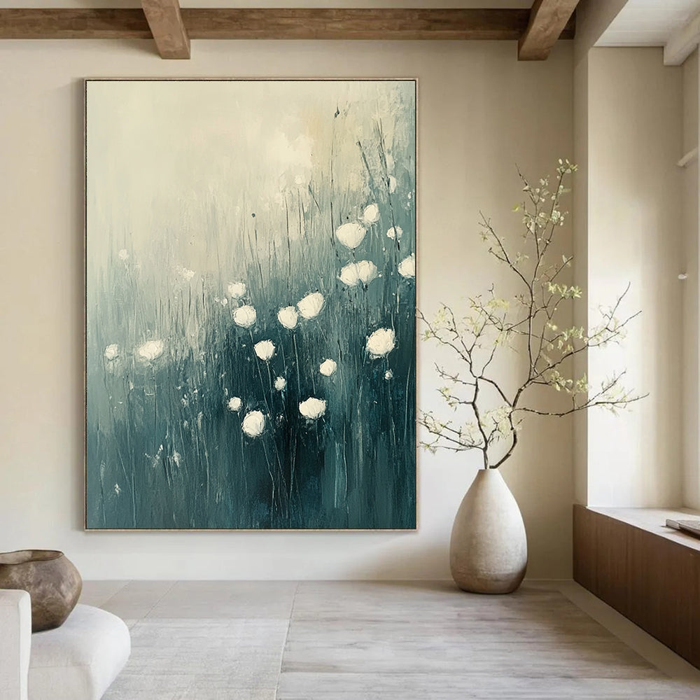 Large abstract oil painting of flowers in grass featuring white and light blue tones with muted colors, perfect for enhancing any space.STSC184