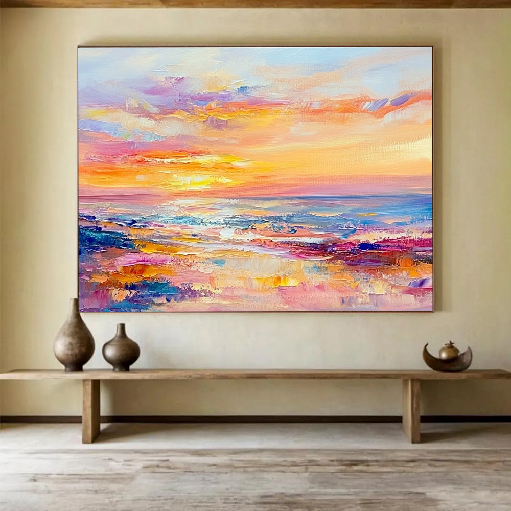 A large abstract painting of the sea at sunset in pastel colors with soft brushstrokes evokes calmness and tranquility.SC416