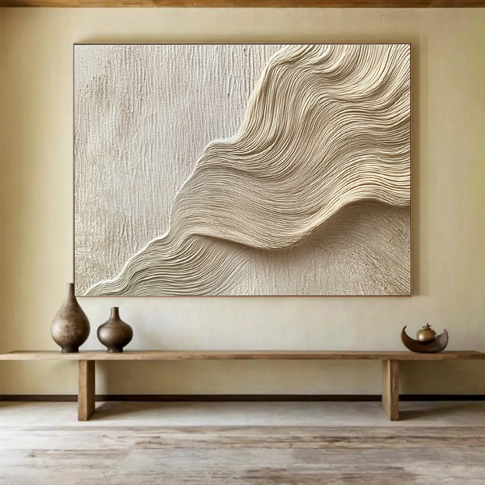 Large abstract painting featuring layered waves and curves in light beige tones resembling water ripples on sand dunes with fine brushwork.SC613