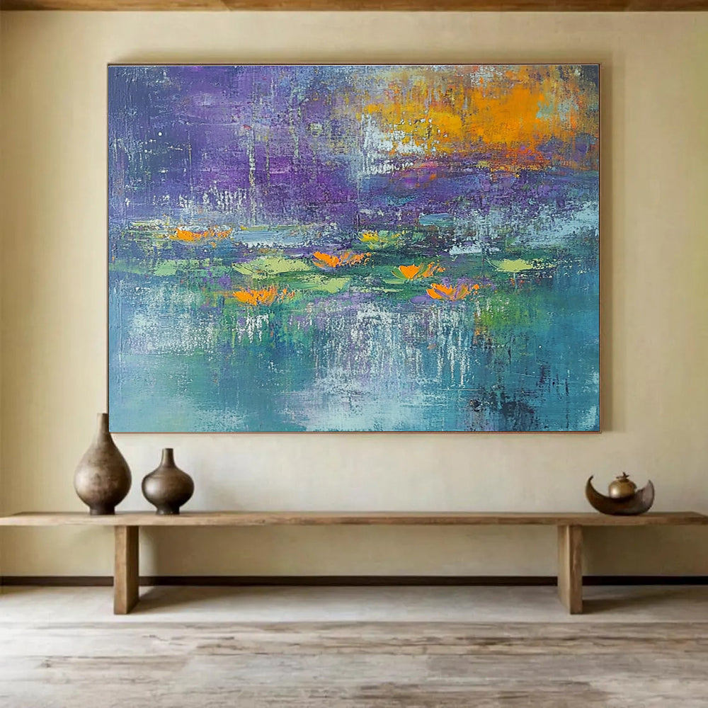 A large abstract painting featuring textured strokes in teal and purple with hints of orange and yellow, depicting serene water lilies at dawn.SC433