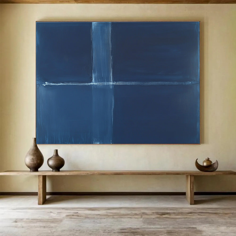 A large abstract painting featuring a deep blue background with a thin straight line and a thick wavy line in the center.SC515