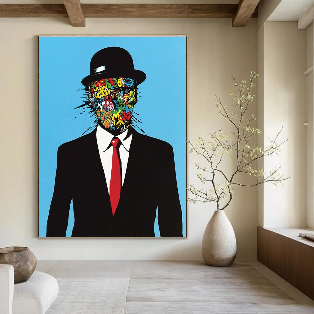 An abstract artwork featuring a man in a black suit and red tie with graffiti on his face against a blue background in a surreal style.STSC1056