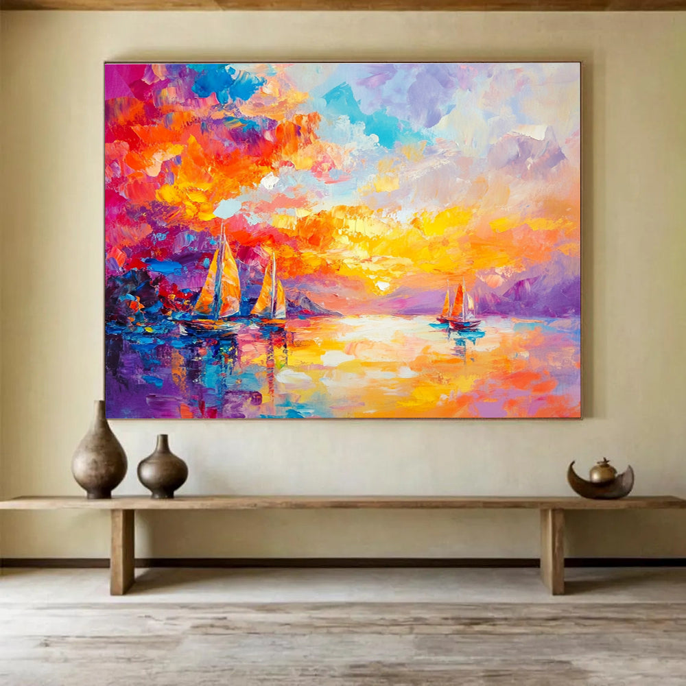 Large abstract painting capturing a vibrant sunset over the sea with sailboats in a colorful and dreamlike style.SC180