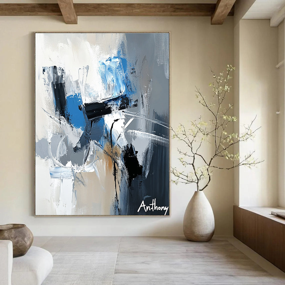 Large abstract painting featuring the name Anthony in white gray and blue tones with dynamic brush strokes and rich textures.STSC450