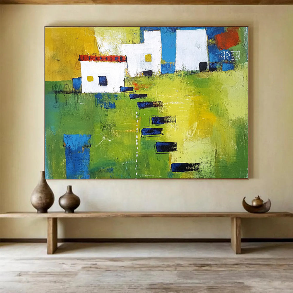 Large abstract painting showcasing green fields, white buildings with blue lines, and black stairs, featuring thick brush strokes and vibrant geometric shapes.SC193