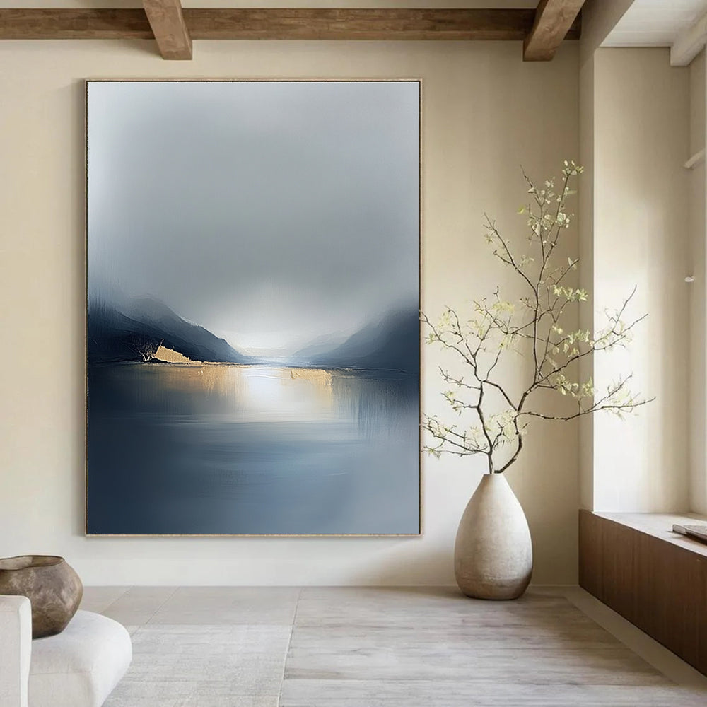 Large abstract painting in soft gray tones with gold accents evoking serene solitude and reflection on life's vast journey across a misty sea.STSC088