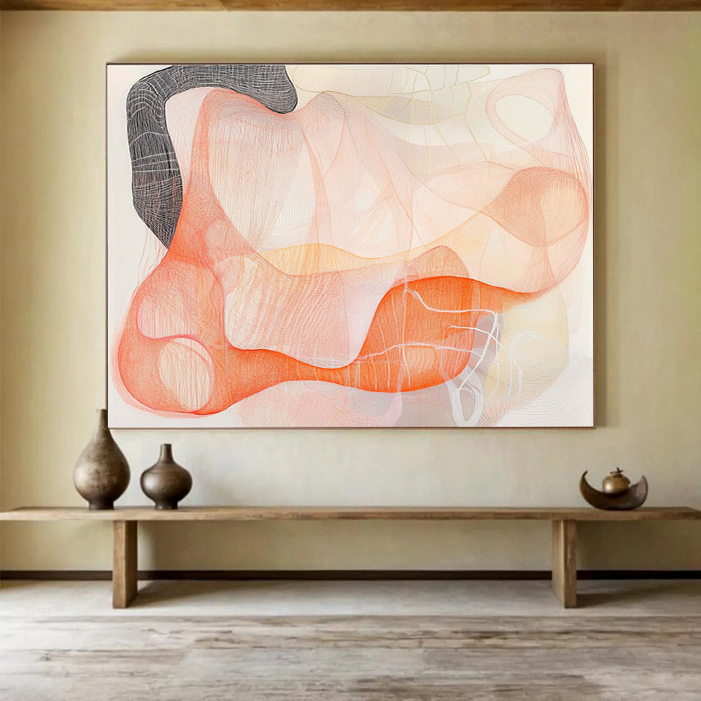 Large abstract artwork featuring delicate orange and pink threads with a black ink outline suggesting women's forms against a white background, evoking calm and elegance.SC304