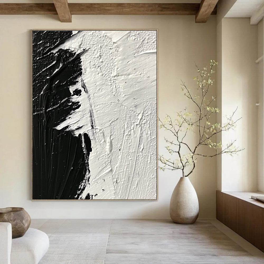 Large abstract painting featuring thick textured brushstrokes in striking black and white tones that evoke profound emotion and creativity.STSC1282