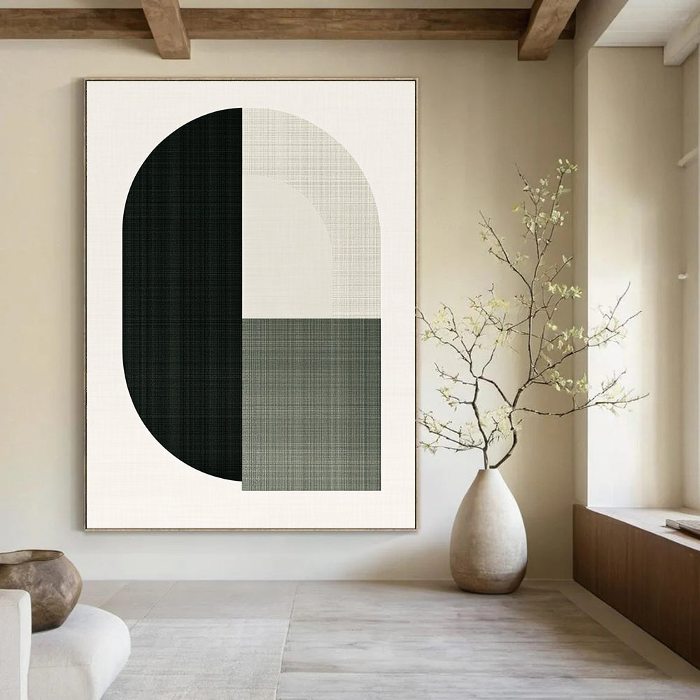 A large abstract illustration featuring an arch and half circle in green shades symbolizes the letter O for a top-grain rug brand.STSC1179