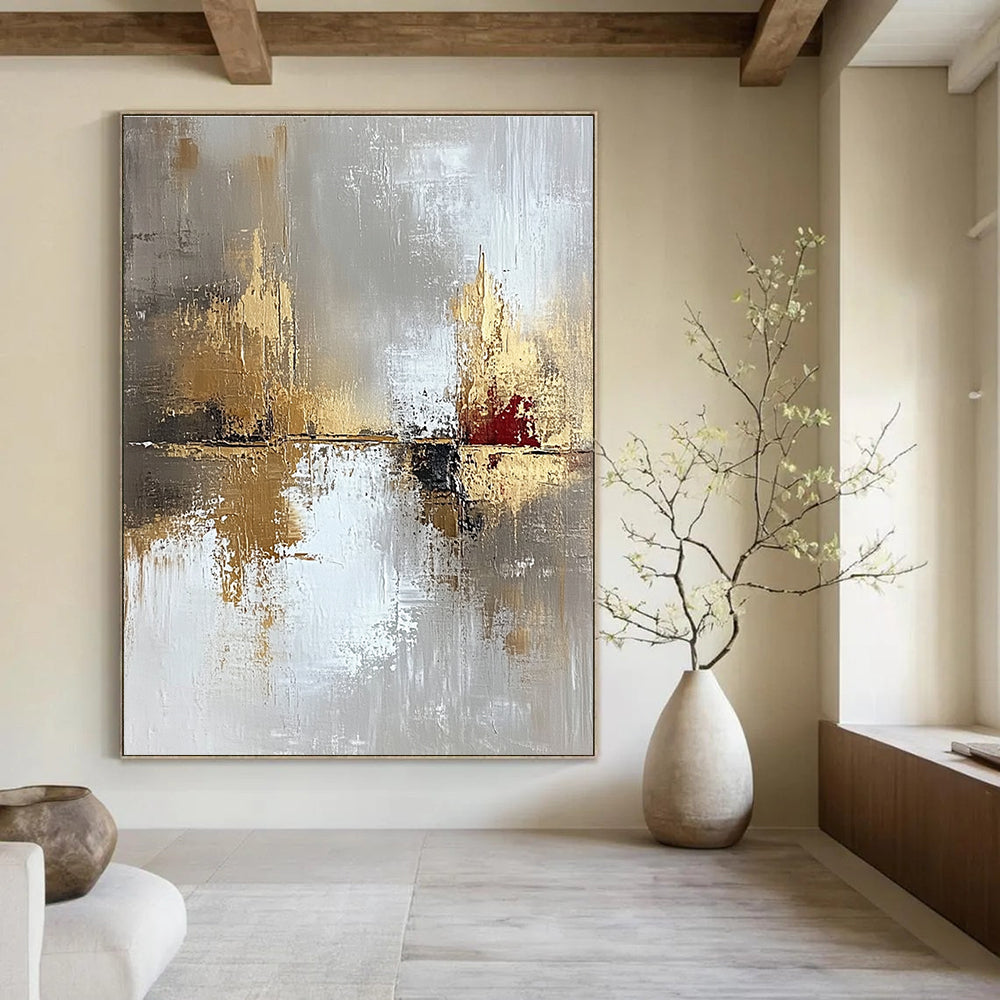 Large abstract painting in light gray and gold with oil brush effect featuring layers of texture and subtle red accents for visual impact.STSC402