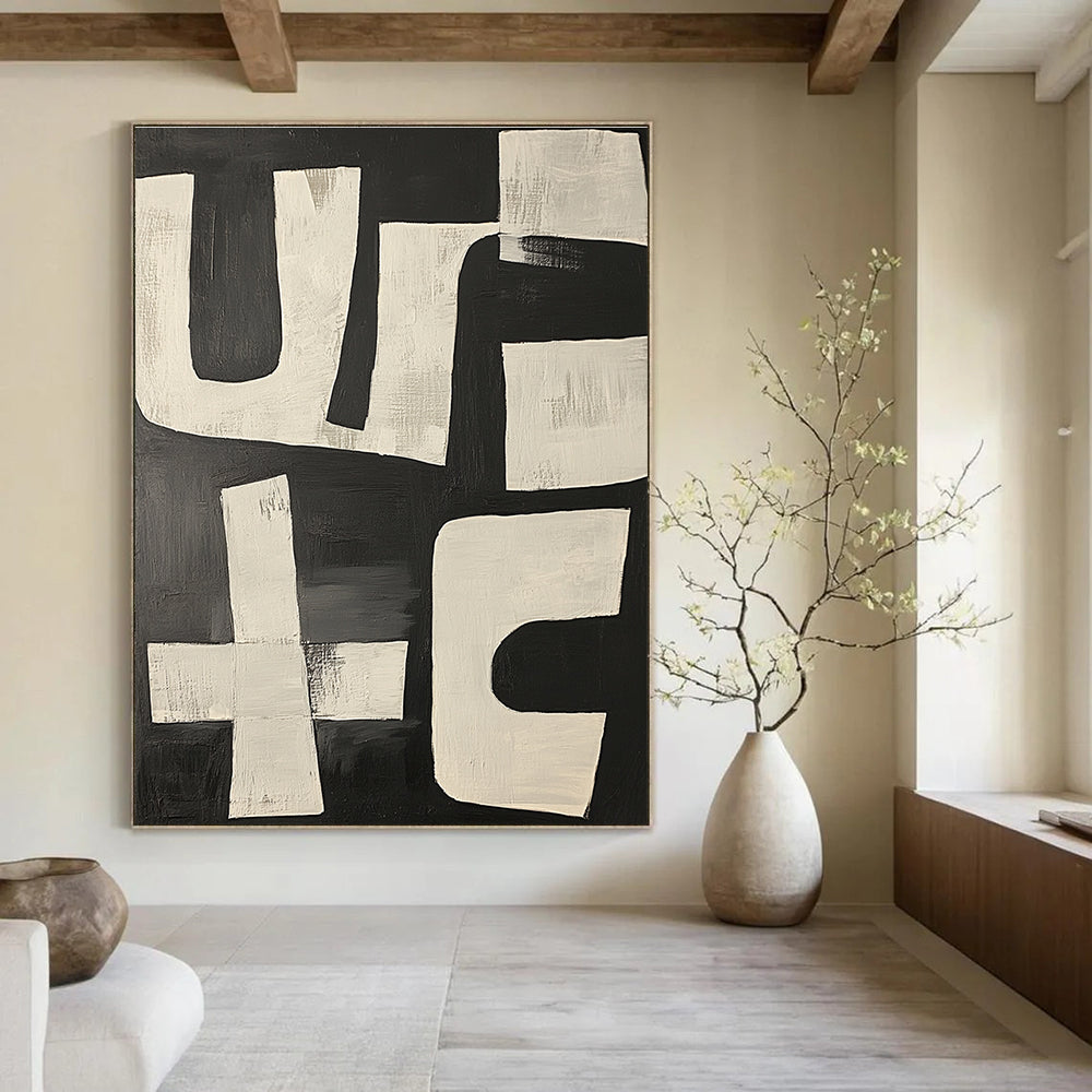 Large abstract painting featuring dynamic black and white shapes resembling the word use in a bold and energetic composition.STSC1133