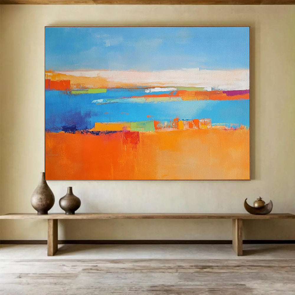 Large abstract painting featuring a soft blue background vibrant oranges geometric patterns warm yellows with green shapes and white figures symbolizing nature.SC060