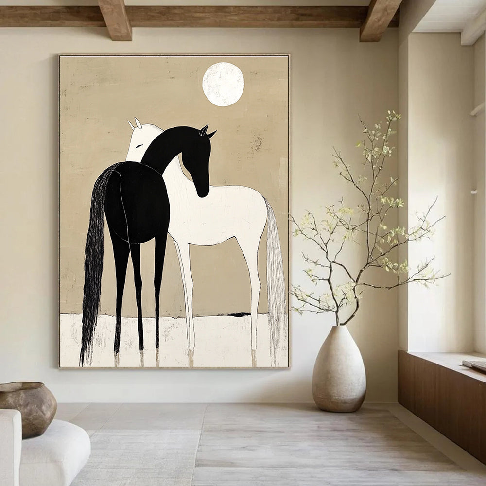 A large abstract painting depicting a black horse and white pony cuddling under a moonlit sky with simple shapes and a minimalistic beige background.STSC915