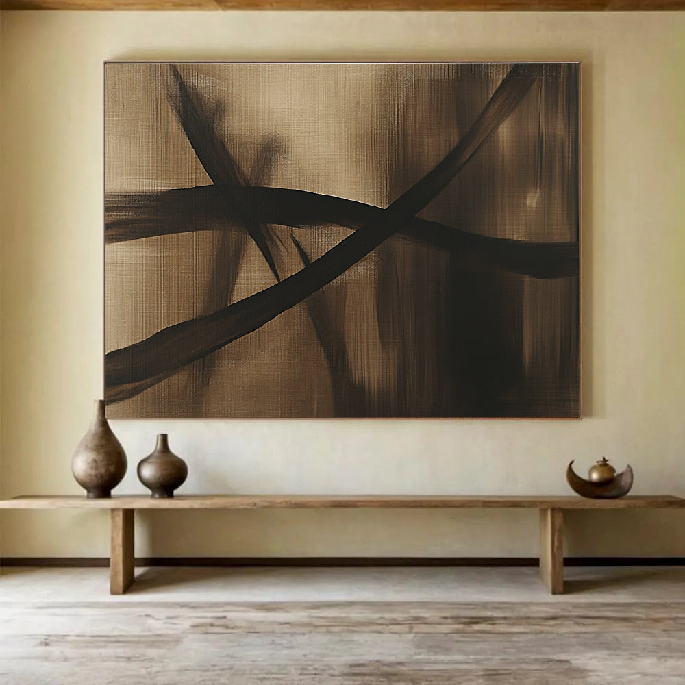Large abstract painting in brown and black tones featuring a dragonfly silhouette and flowing lines on a dark gray background, exuding mystery and simplicity.SC586
