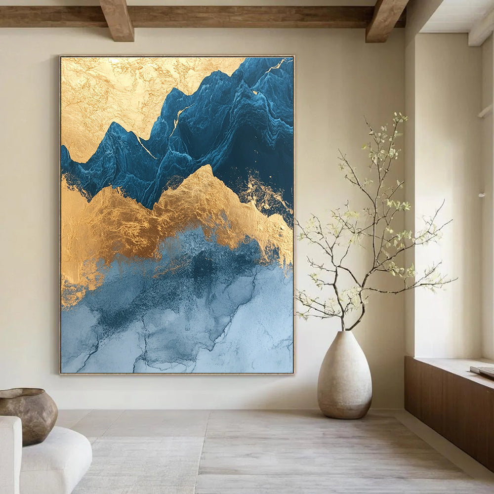 Abstract painting with marble texture rounded edges in gold foil and dark blue glass outlines featuring mountains and simple decorative lines.STSC1312