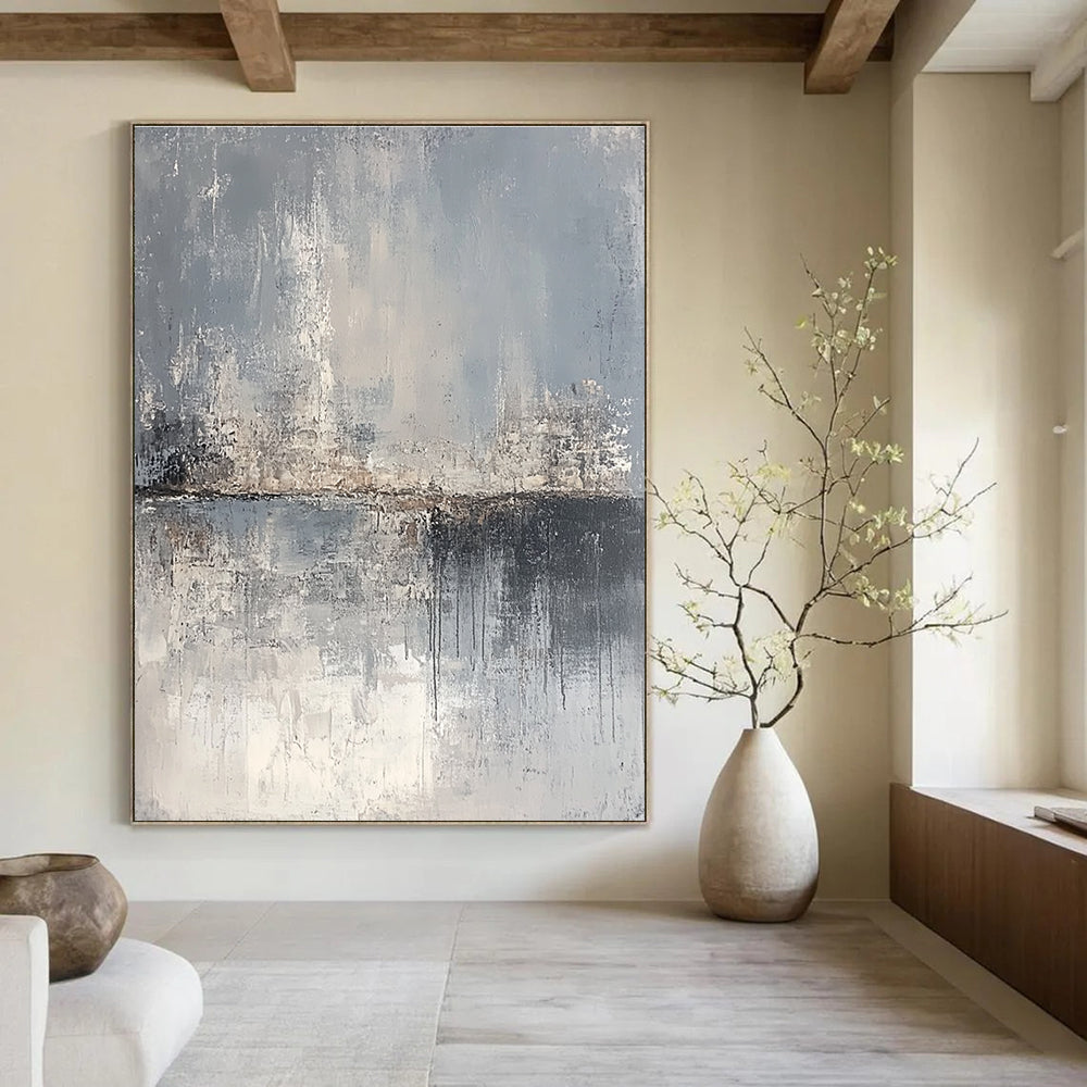Large abstract painting depicting a serene landscape in gray and beige tones, featuring canvas texture and an atmospheric quality.STSC063