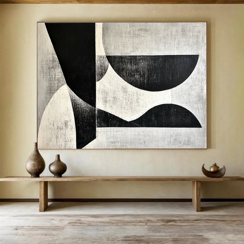 A large abstract painting featuring black and white shapes on a gray background inspired by Wim de Vries artistic style.SC506
