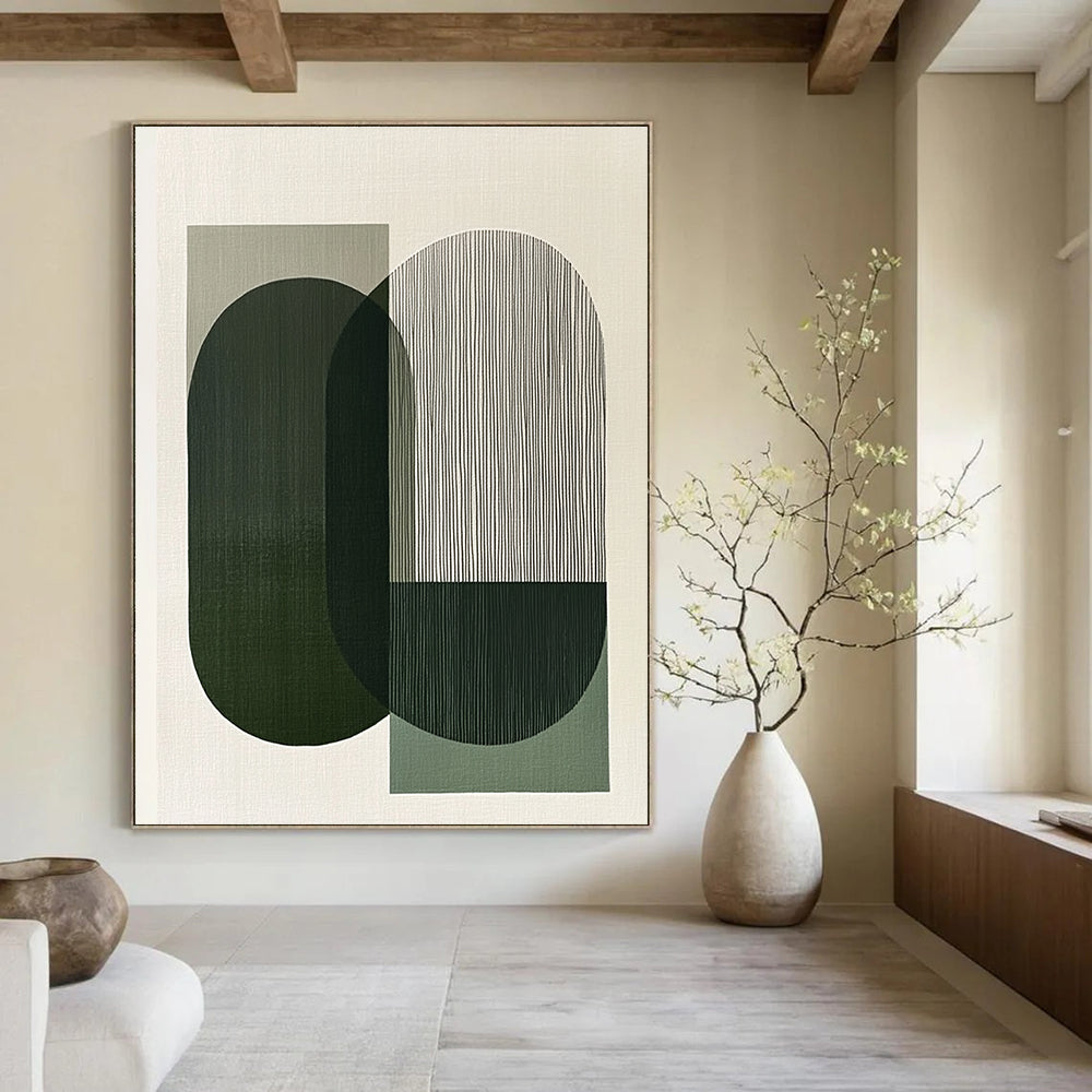 A large abstract painting features overlapping green and gray shapes evoking calmness and balance through minimalist design and clean lines.STSC1178