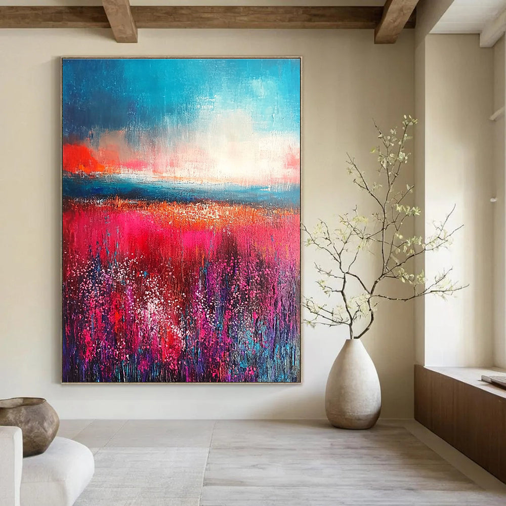 Large abstract painting with thick brush strokes in reds and pinks featuring an aqua blue sky and a detailed field of flowers.STSC117
