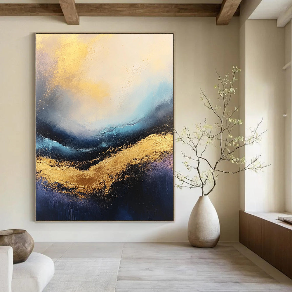 Large abstract painting of stormy seas featuring rich gold and blue tones with a captivating textured surface.STSC333