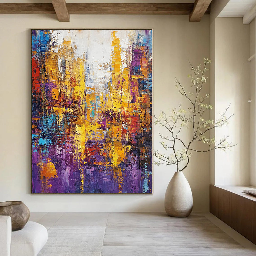 Large abstract oil painting featuring a cityscape in gold and purple tones with colorful patterns and textured brush strokes.STSC160