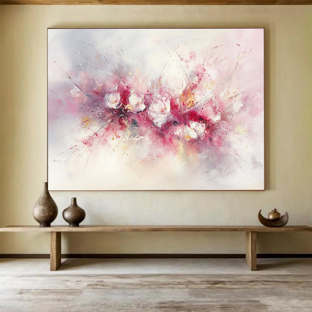 Large abstract painting of flowers in soft pink and white hues featuring bold brush strokes and delicate textures against a light background.SC191