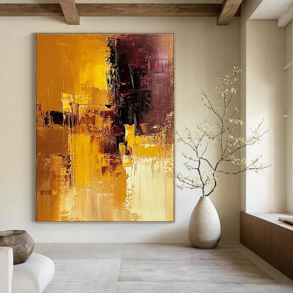 Large abstract painting in warm brown and yellow tones showcasing a textured surface for a striking artistic statement.STSC603
