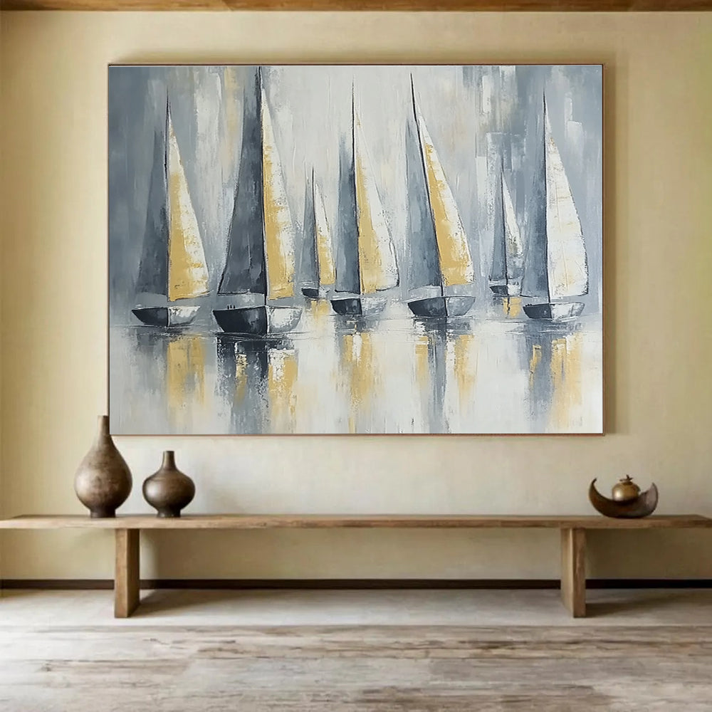 Large abstract painting featuring sailing boats with gray and gold sails on calm waters under soft lighting and a neutral background.SC610