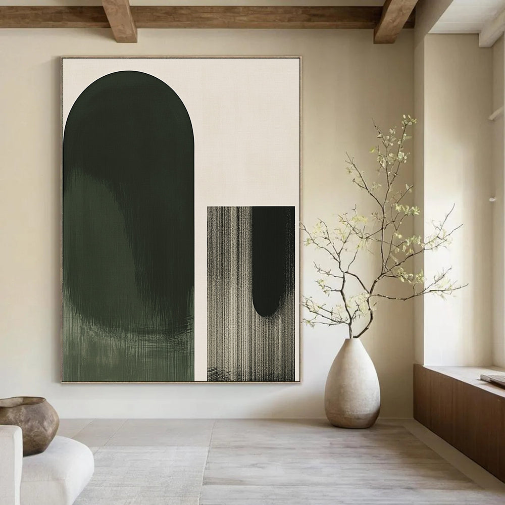 A large abstract green oval contrasts elegantly against a light gray background with a simple black geometric outline in front.STSC1031