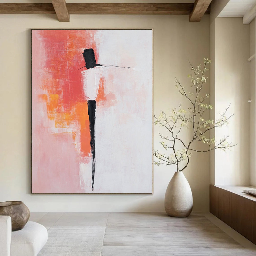 Large abstract painting with pink and white background featuring bold brush strokes simple shapes and peachy red accents with black dress shoes.STSC404