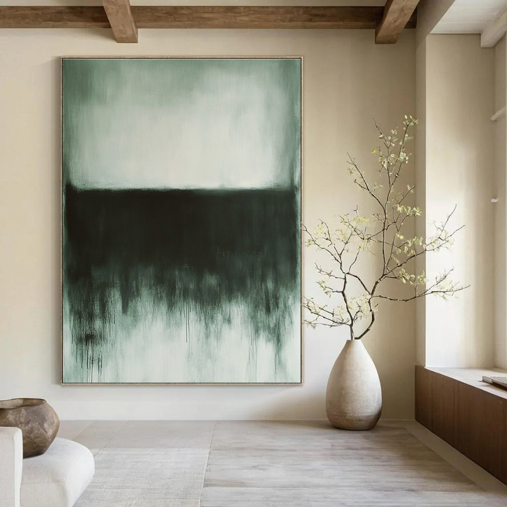 Large abstract painting in gray and white tones evoking calmness with dark gray and light green elements and textured details in the corner.STSC757