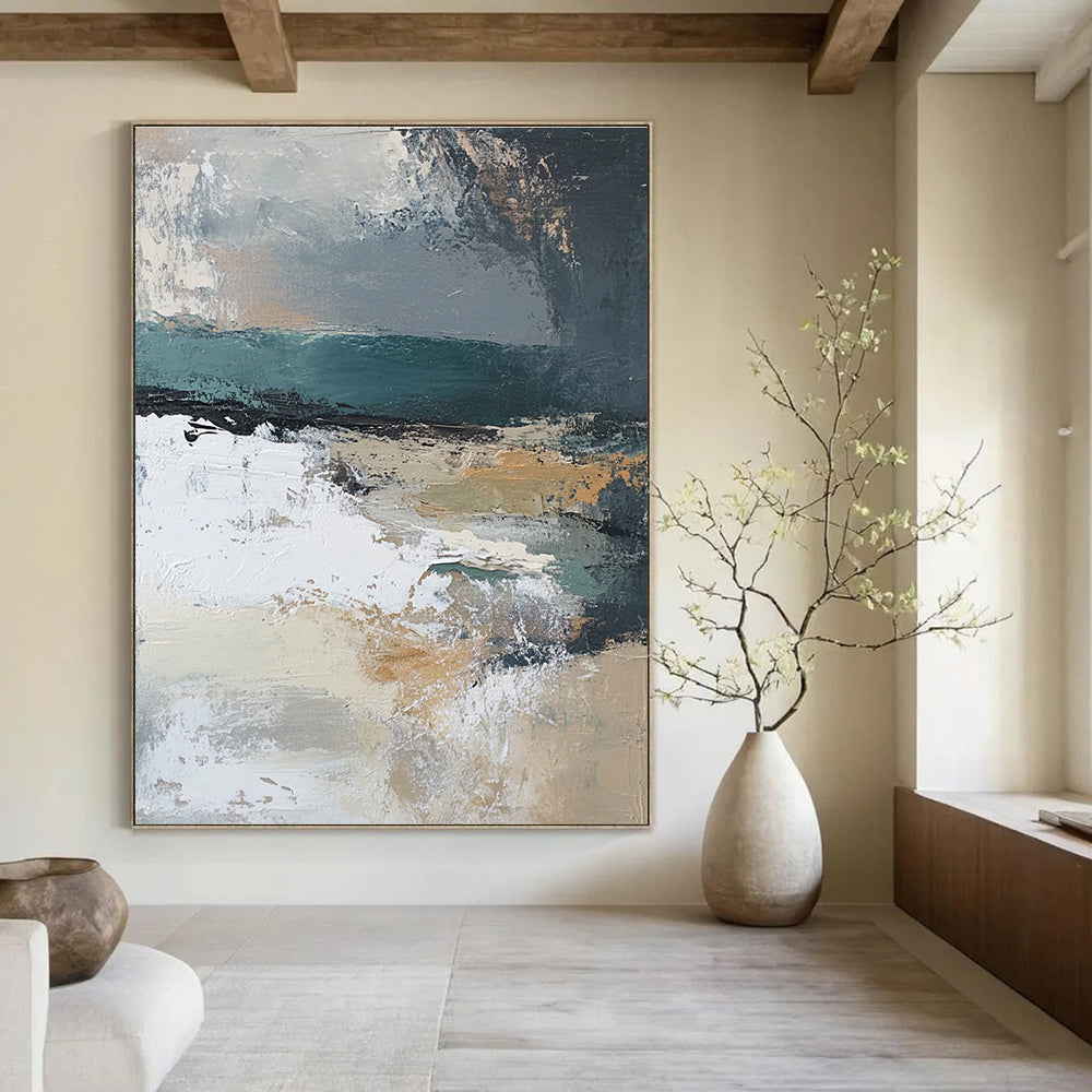 Large abstract painting featuring muted beige grey teal silver and green hues with white abstract shapes and textured layers depicting a serene landscape.STSC380