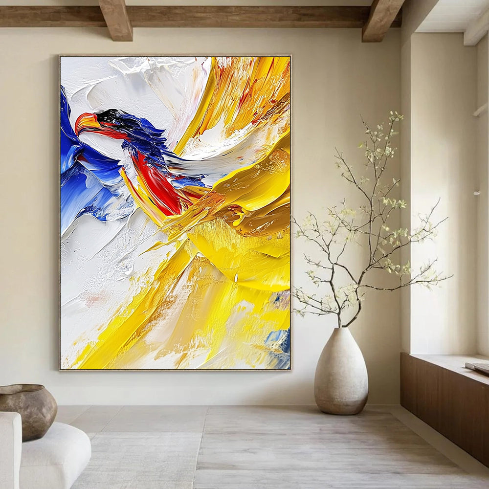 Large abstract painting with impasto technique showcasing vibrant yellow and blue hues featuring a detailed vulture against a white cloud background.STSC426