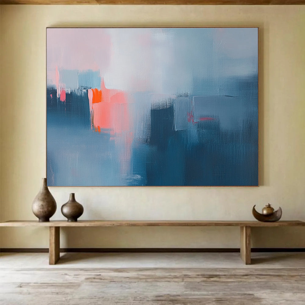 Large abstract oil painting depicting a misty rain with blue and grey hues highlighted by pink and orange accents.SC319