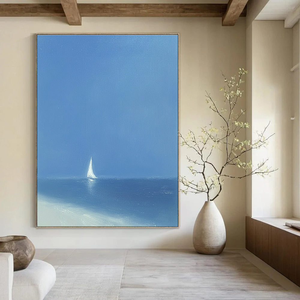 A large abstract painting featuring a minimalist white sailboat on the ocean under a blue sky with soft tones and wide brush strokes.STSC1062