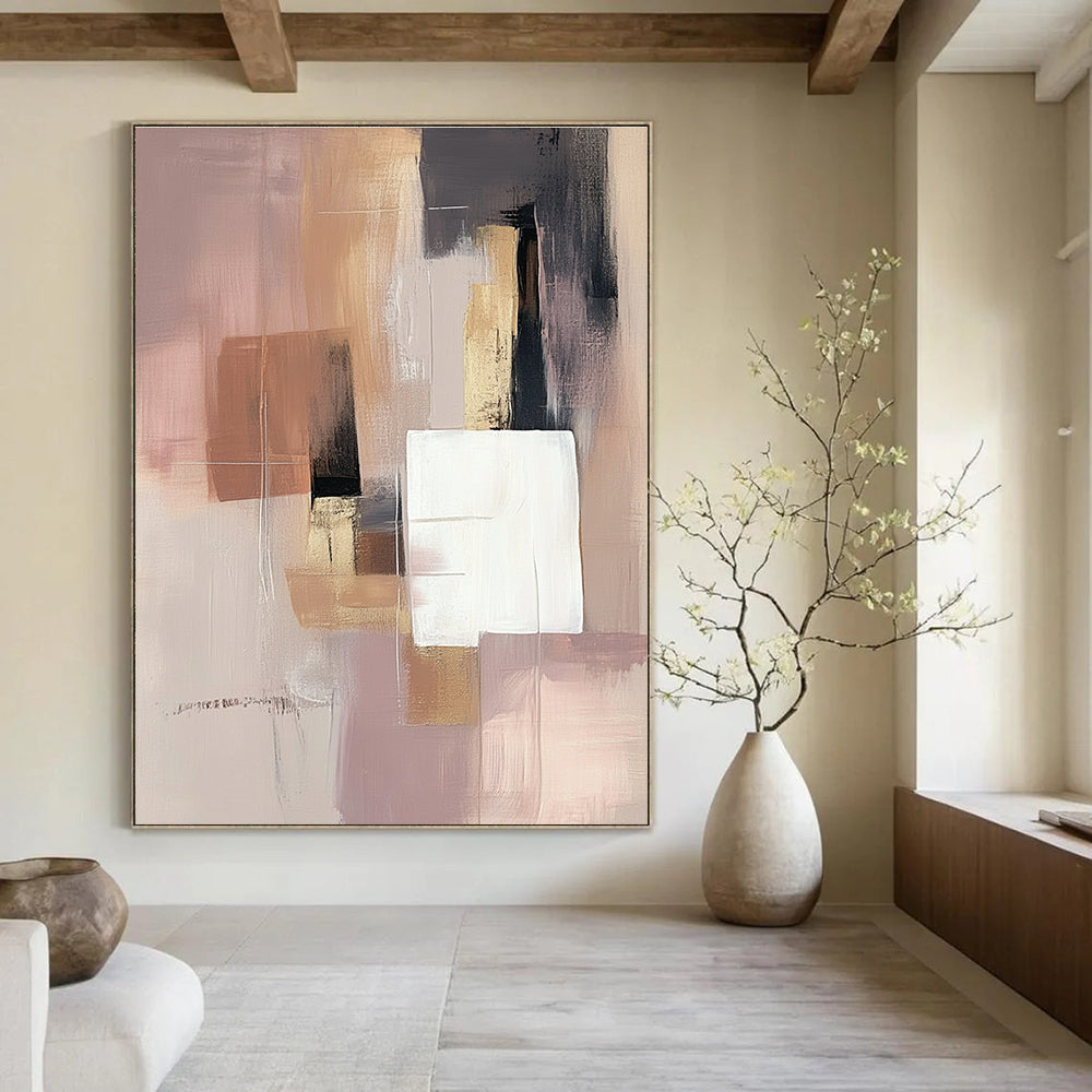 Large abstract painting in soft pink beige and grey with white squares and a brown gray shape featuring gold accents.STSC808
