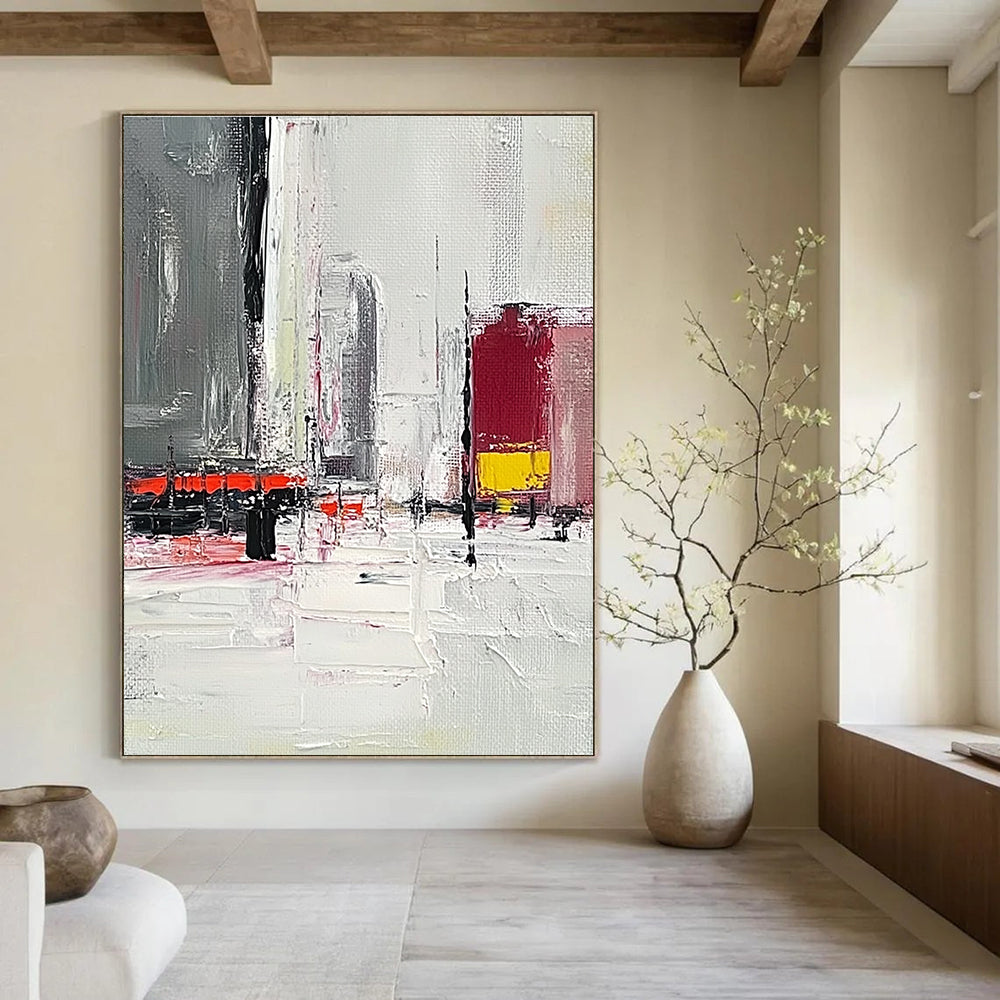 Large abstract painting featuring a grey and white urban landscape with red and yellow accents and thick brush strokes on a textured canvas.STSC154