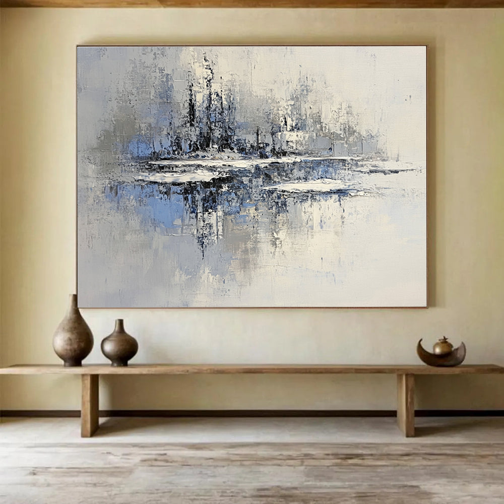 Large abstract painting of an icy lake with floating islands in muted gray and blue tones featuring textured brush strokes and serene winter lighting.SC158