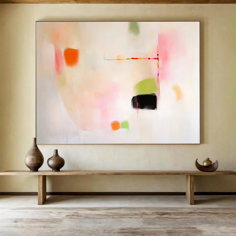 Large abstract painting featuring pink green and orange shapes on white background evoking calmness with gentle curves and contrasting black spaces.SC379