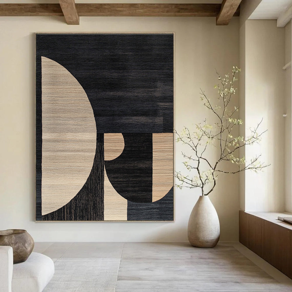Large abstract rug featuring a minimalistic Bauhaus design with soft edges contrasting dark gray beige black and white tones.STSC1169