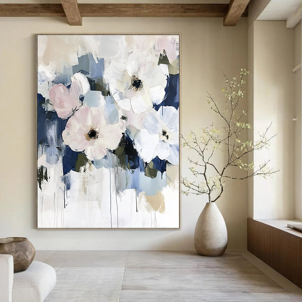 Large abstract floral painting in soft pinks and whites with hints of blue featuring minimalist style and soft brushstrokes on neutral tones.STSC056