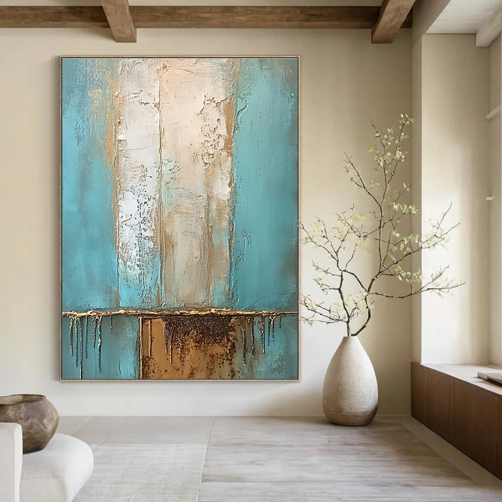 Large abstract oil painting with muted teal and beige hues accented by gold featuring a textured surface and a rusted metal element.STSC602