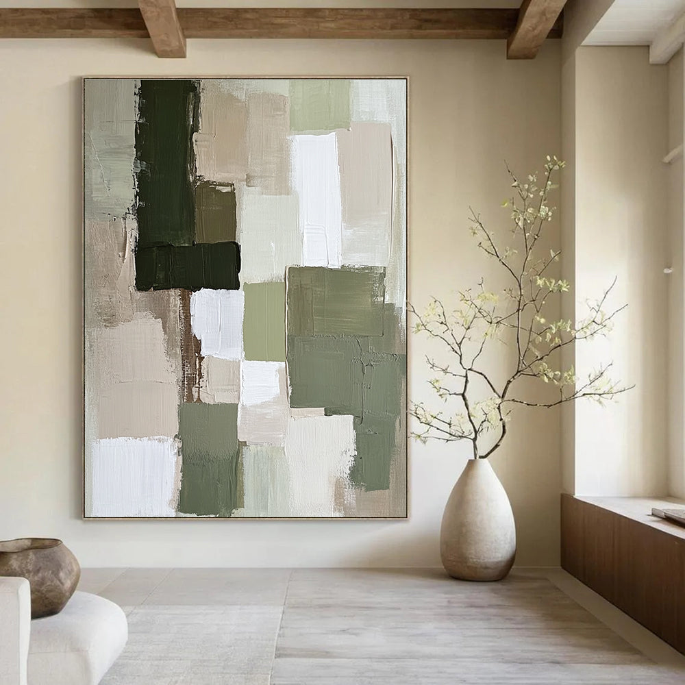 Large abstract painting featuring soft neutral tones like sage green and beige with dynamic textures and shapes that create a calm atmosphere.STSC767