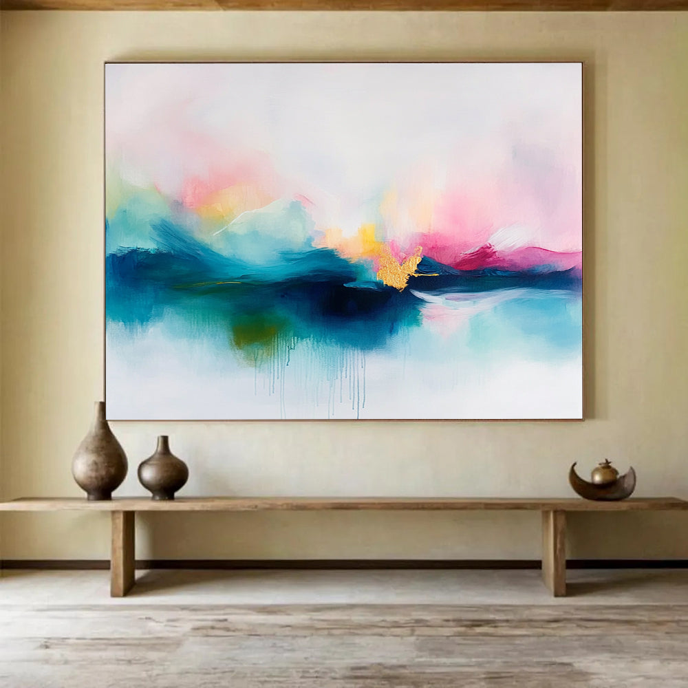 A large abstract painting featuring soft pastel colors in pinks and blues with delicate gold accents on a serene white background.SC383